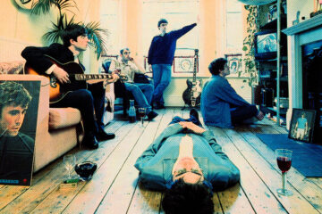 Oasis en la portada de Definitely Maybe