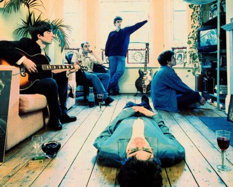 Oasis en la portada de Definitely Maybe