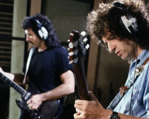 Brian May y Tony Iommi en un estudio