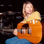 Kurt Cobain con su guitarra en el estudio