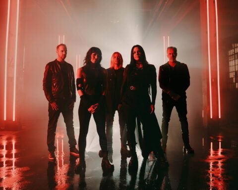 Evanescence en retrato con luces rojas