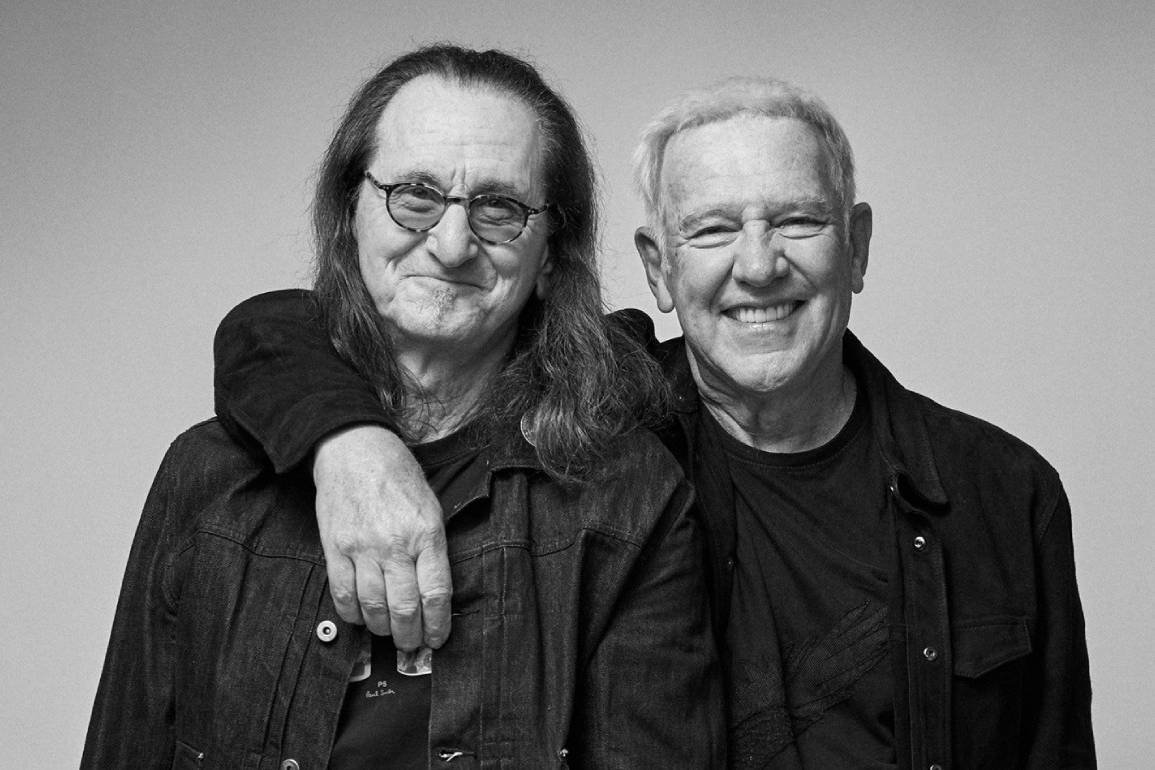 Rush con Lee y Lifeson abrazados