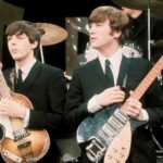 John Lennon y Paul McCartney en concierto con The Beatles